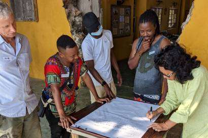 participants working on solutions at the green destination workshop on Chumbe Island
