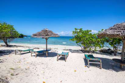 the beach of Chumbe Island during the summer months which is one of the best times to visit Zanzibar