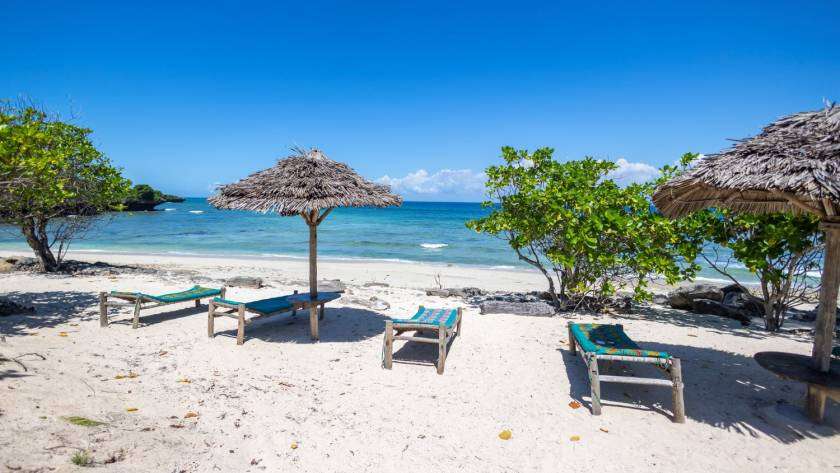 the beach of Chumbe Island during the summer months which is one of the best times to visit Zanzibar